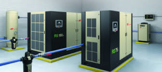 Industrial power and control room with modern electrical equipment including Arle Compressors of Florida and cabling infrastructure.